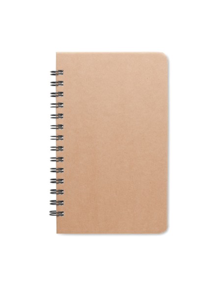 Cuadernos de papel con semillas y hojas rayadas